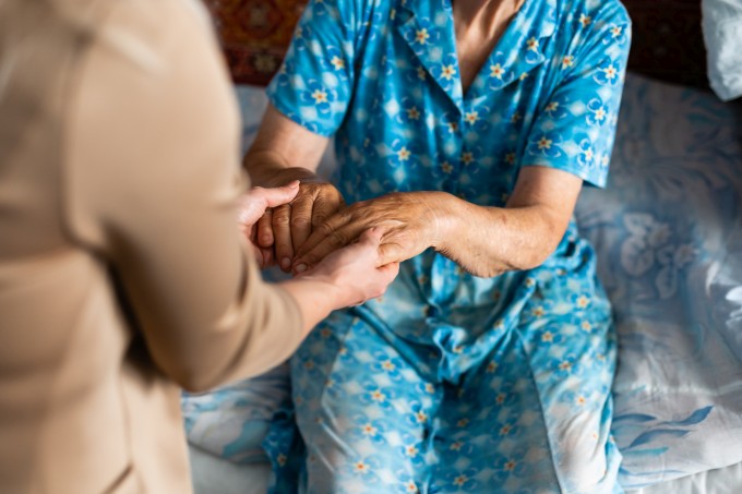 senior woman with her home caregiver